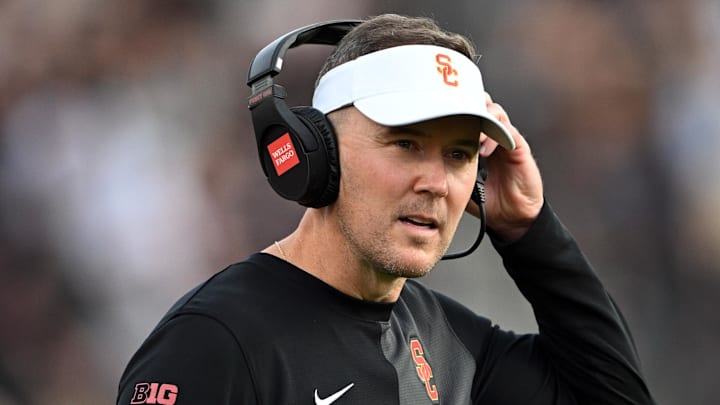 Sep 13, 2025; West Lafayette, Indiana, USA; Southern California Trojans head coach Lincoln Riley stands on the sidelines during the first quarter against the Purdue Boilermakers at Ross-Ade Stadium. Mandatory Credit: Marc Lebryk-Imagn Images