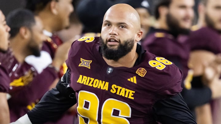 Nov 28, 2025; Tempe, Arizona, USA; Arizona State Sun Devils defensive lineman Anthonie Cooper (96) against the Arizona Wildcats during the 99th Territorial Cup at Mountain America Stadium. Mandatory Credit: Mark J. Rebilas-Imagn Images Nov 28, 2025; Tempe, Arizona, USA; Arizona State Sun Devils defensive lineman Anthonie Cooper (96) against the Arizona Wildcats during the 99th Territorial Cup at Mountain America Stadium. Mandatory Credit: Mark J. Rebilas-Imagn Images