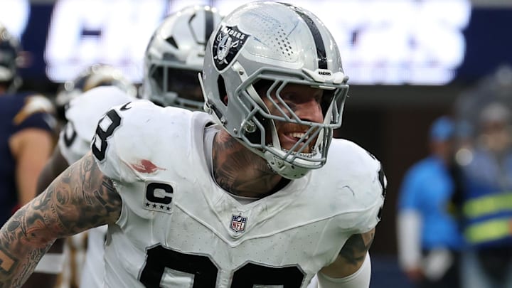 Nov 30, 2025; Inglewood, California, USA; Las Vegas Raiders defensive end Maxx Crosby (98) reacts after a tackle against the Los Angeles Chargers during the second half at SoFi Stadium. Mandatory Credit: Kiyoshi Mio-Imagn Images