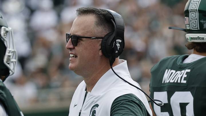 Michigan State head coach Pat Fitzgerald greets players on the sidelines against Eastern Michigan at Spartan Stadium on Saturday, Sept. 12, 2026. Michigan State head coach Pat Fitzgerald greets players on the sidelines against Eastern Michigan at Spartan Stadium on Saturday, Sept. 12, 2026.