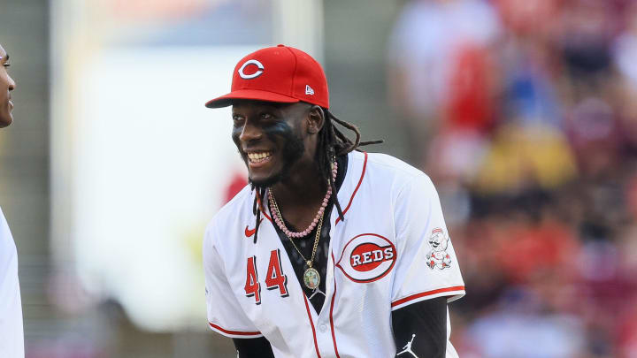 Jun 24, 2024; Cincinnati, Ohio, USA; Cincinnati Reds shortstop Elly De La Cruz (44) signs an autograph for a fan before the game against the Pittsburgh Pirates at Great American Ball Park. Mandatory Credit: Katie Stratman-USA TODAY Sports Jun 24, 2024; Cincinnati, Ohio, USA; Cincinnati Reds shortstop Elly De La Cruz (44) signs an autograph for a fan before the game against the Pittsburgh Pirates at Great American Ball Park. Mandatory Credit: Katie Stratman-USA TODAY Sports