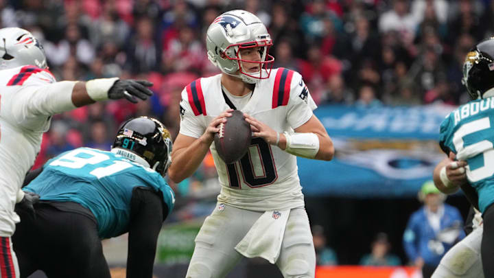 Oct 20, 2024; London, United Kingdom; New England Patriots quarterback Drake Maye (10) throws the ball against the Jacksonville Jaguars in the first half of an NFL International Series game at Wembley Stadium. Mandatory Credit: Kirby Lee-Imagn Images