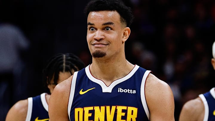 Jan 20, 2026; Denver, Colorado, USA; Denver Nuggets forward Spencer Jones (21) reacts after a play in the third quarter against the Los Angeles Lakers at Ball Arena. Mandatory Credit: Isaiah J. Downing-Imagn Images
