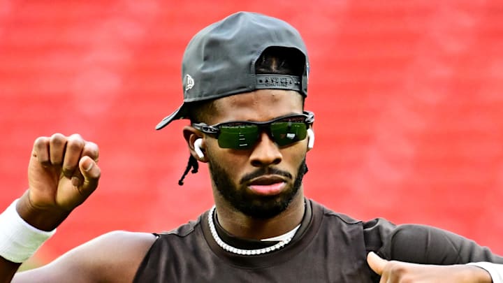 Nov 30, 2025; Cleveland, Ohio, USA;  Cleveland Browns quarterback Shedeur Sanders (12) warms up before the game against the San Francisco 49ers at Huntington Bank Field.