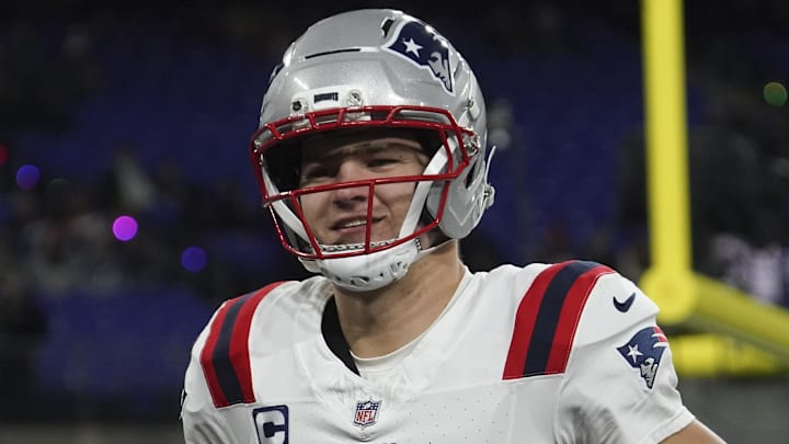 Dec 21, 2025; Baltimore, Maryland, USA;  New England Patriots quarterback Drake Maye (10) warms up prior to the game against the Baltimore Ravens at M&T Bank Stadium. Mandatory Credit: James Lang-Imagn Images