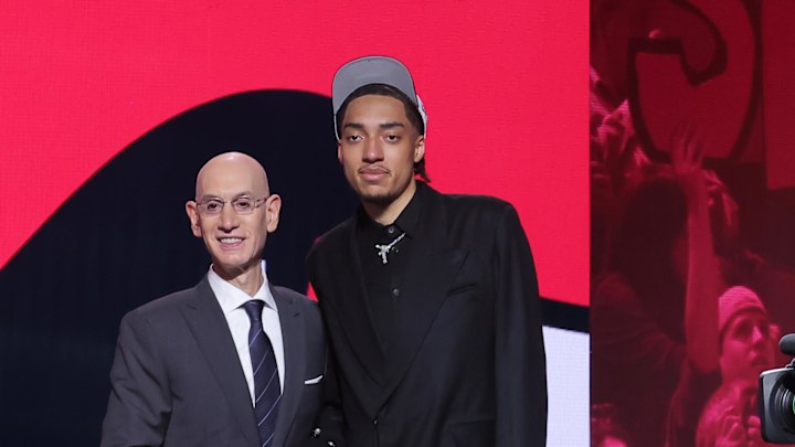 Jun 25, 2025; Brooklyn, NY, USA; Noa Essengue stands with NBA commissioner Adam Silver after being selected as the 12th pick by the Chicago Bulls in the first round of the 2025 NBA Draft at Barclays Center. Mandatory Credit: Brad Penner-Imagn Images Jun 25, 2025; Brooklyn, NY, USA; Noa Essengue stands with NBA commissioner Adam Silver after being selected as the 12th pick by the Chicago Bulls in the first round of the 2025 NBA Draft at Barclays Center. Mandatory Credit: Brad Penner-Imagn Images