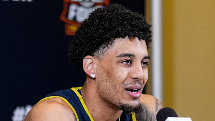 Michigan forward Yaxel Lendeborg answers a question at break out room before open practice Michigan forward Yaxel Lendeborg answers a question at break out room before open practice