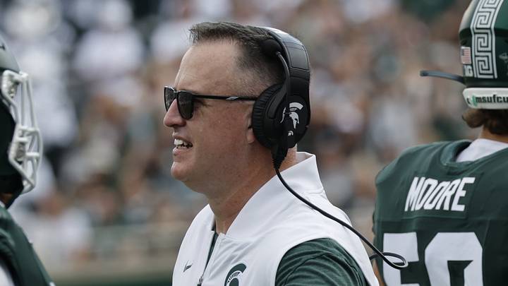 Michigan State head coach Pat Fitzgerald greets players on the sidelines against Eastern Michigan at Spartan Stadium on Saturday, Sept. 12, 2026. Michigan State head coach Pat Fitzgerald greets players on the sidelines against Eastern Michigan at Spartan Stadium on Saturday, Sept. 12, 2026.