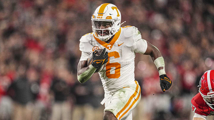 Locking in our predictions against the spread for college football's historic first-round playoff games today.