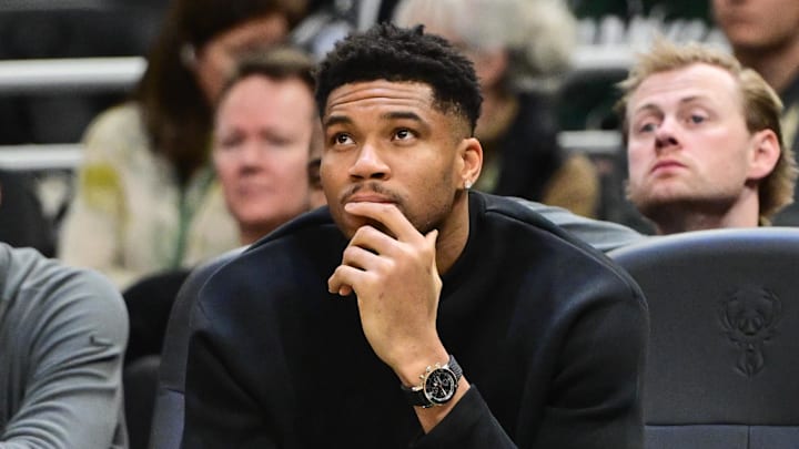 Dec 11, 2025; Milwaukee, Wisconsin, USA; Milwaukee Bucks forward Giannis Antetokounmpo (34) looks on from the bench while recovering from an injury in the second quarter against the Boston Celtics at Fiserv Forum. Mandatory Credit: Benny Sieu-Imagn Images