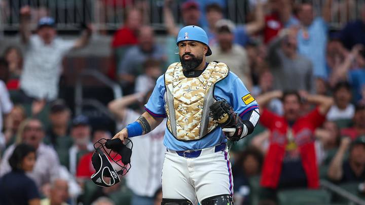 May 16, 2026; Atlanta, Georgia, USA; Atlanta Braves catcher Sandy Leon (9) react after a call against the Boston Red Sox in the fourth inning at Truist Park. Mandatory Credit: Brett Davis-Imagn Images May 16, 2026; Atlanta, Georgia, USA; Atlanta Braves catcher Sandy Leon (9) react after a call against the Boston Red Sox in the fourth inning at Truist Park. Mandatory Credit: Brett Davis-Imagn Images
