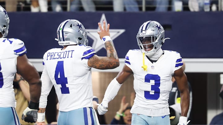 Dallas Cowboys wide receiver George Pickens celebrates a touchdown with Dak Prescott against the Philadelphia Eagles 
