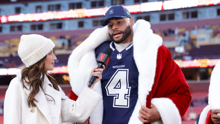 Kay Adams interviews Dallas Cowboys quarterback Dak Prescott after a win over the Washington Commanders at Northwest Stadium. 