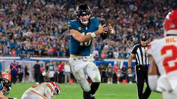 Jacksonville Jaguars wide receiver Travis Hunter (12) scrambles for a game-winning touchdown during the fourth quarter of an NFL football matchup at EverBank Stadium, Monday, Oct. 6, 2025, in Jacksonville, Fla. The Jacksonville Jaguars edged the Kansas City Chiefs 31-28. [Corey Perrine/Florida Times-Union]
