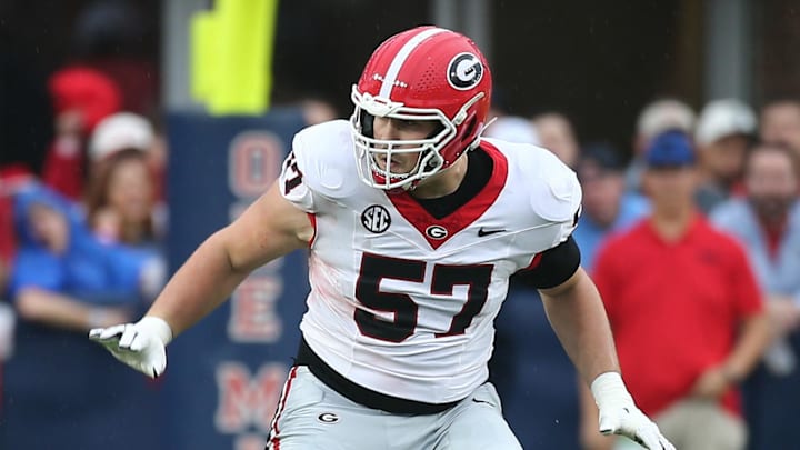 Georgia Bulldogs offensive lineman Monroe Freeling (57) blocks Mississippi Rebels defensive lineman Princely Umanmielen