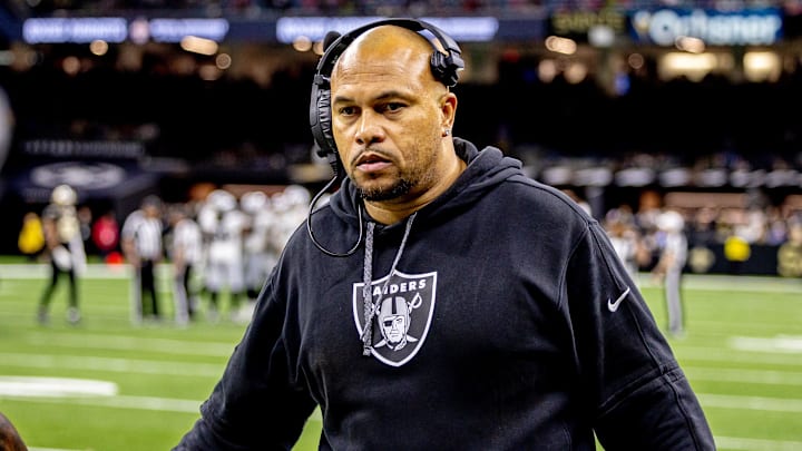 Dec 29, 2024; New Orleans, Louisiana, USA;  Las Vegas Raiders head coach Antonio Pierce congratulates players after an interception against the New Orleans Saints during the second half at Caesars Superdome. Mandatory Credit: Stephen Lew-Imagn Images