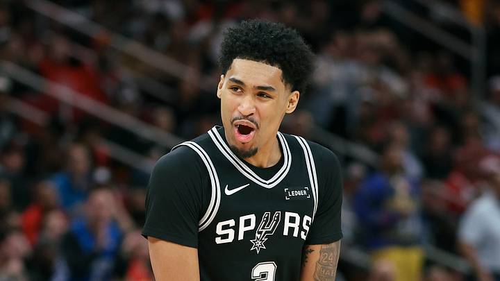 Jan 28, 2026; Houston, Texas, USA; San Antonio Spurs guard Dylan Harper (2) reacts after scoring a basket during the third quarter against the Houston Rockets at Toyota Center. Mandatory Credit: Troy Taormina-Imagn Images