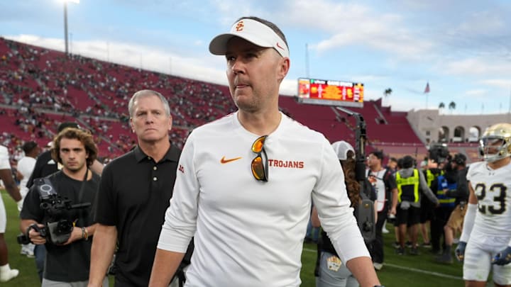 Nov 30, 2024; Los Angeles, California, USA; Southern California Trojans head coach Lincoln Riley leaves the field after the game against the Notre Dame Fighting Irish at United Airlines Field at Los Angeles Memorial Coliseum. Mandatory Credit: Kirby Lee-Imagn Images