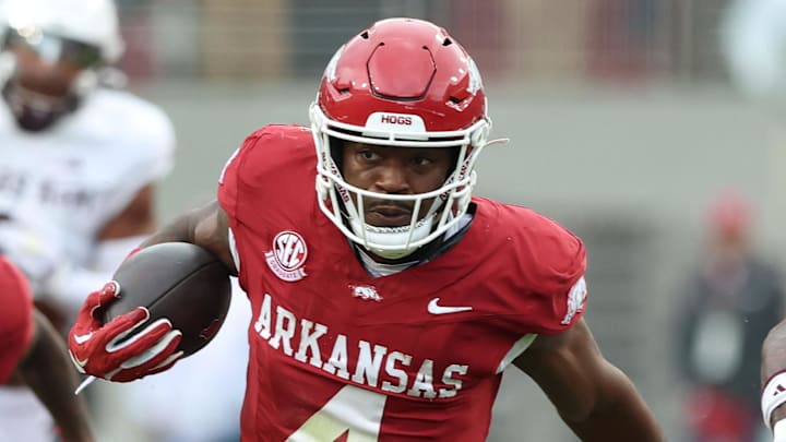 Arkansas Razorbacks running back Mike Washington Jr. finds a hole against Texas A&M.