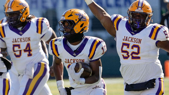 Jackson's Ezavier Crowell (13) breaks a long touchdown run against Cherokee County in the 2024 AHSAA 4A State Championship game.