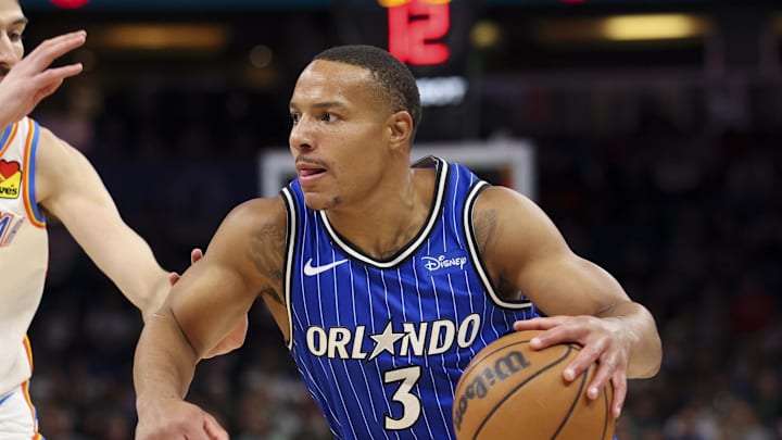Mar 17, 2026; Orlando, Florida, USA; Orlando Magic guard Desmond Bane (3) drives to the basket past Oklahoma City Thunder center Chet Holmgren (7) in the first quarter at Kia Center. Mandatory Credit: Nathan Ray Seebeck-Imagn Images