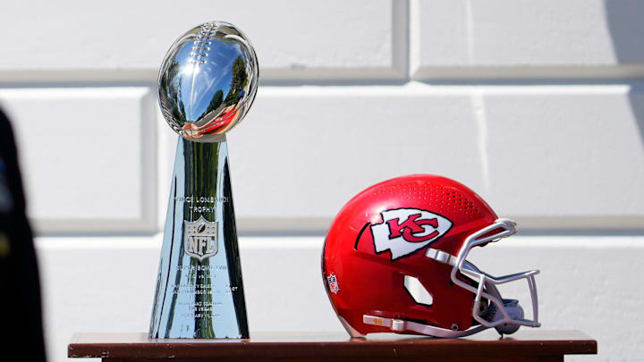 A Kansas City Chiefs helmet and the Vince Lombardi Trophy wait for President Joe Biden and the Super Bowl champion team during the Chiefs' visit to the White House on May 31, 2024.