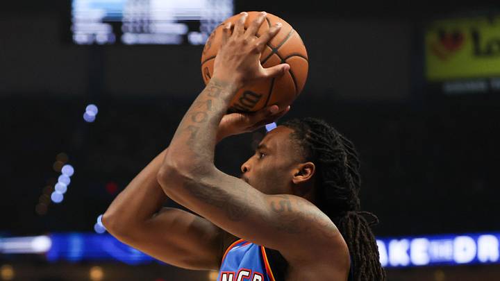 May 20, 2026; Oklahoma City, Oklahoma, USA; Oklahoma City Thunder guard Cason Wallace (22) shoots during the third quarter against the San Antonio Spurs during game two of the western conference finals for the 2026 NBA playoffs at Paycom Center. Mandatory Credit: Brett Rojo-Imagn Images