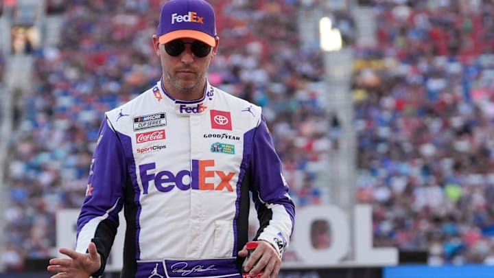 Sep 21, 2024; Bristol, Tennessee, USA; NASCAR Cup Series driver Denny Hamlin (11) during introductions for the Bass Pro Shops Night Race at Bristol Motor Speedway.