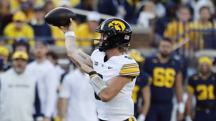 Sep 26, 2026; Ann Arbor, Michigan, USA; Iowa Hawkeyes quarterback Hank Brown (9) passes against the Michigan Wolverines during the second half at Michigan Stadium. Sep 26, 2026; Ann Arbor, Michigan, USA; Iowa Hawkeyes quarterback Hank Brown (9) passes against the Michigan Wolverines during the second half at Michigan Stadium.