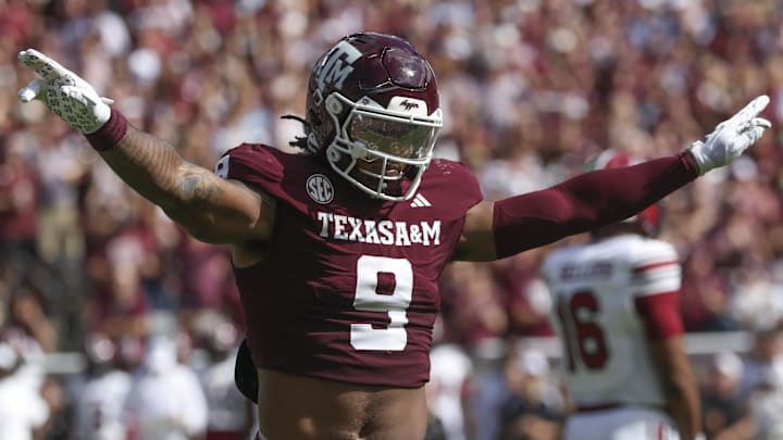 Nov 15, 2025; College Station, Texas, USA; Texas A&M Aggies defensive end Cashius Howell (9) reacts after a defensive play during the first quarter against the South Carolina Gamecocks at Kyle Field. Mandatory Credit: Troy Taormina-Imagn Images