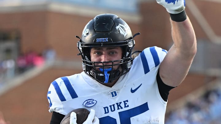 Nov 22, 2025; Chapel Hill, North Carolina, USA; Duke Blue Devils tight end Jeremiah Hasley (85) scores a touchdown during the first half against the North Carolina Tar Heels at Kenan Stadium. Mandatory Credit: William Howard-Imagn Images