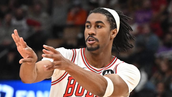 Feb 5, 2026; Toronto, Ontario, CAN;  Chicago Bulls guard Jaden Ivey (31) passes against the Toronto Raptors in the second half at Scotiabank Arena. Mandatory Credit: Dan Hamilton-Imagn Images