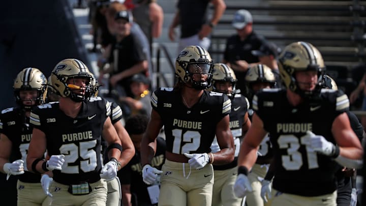 Purdue Boilermakers take the field to warm up Purdue Boilermakers take the field to warm up