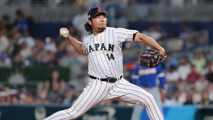 Mar 14, 2026; Miami, FL, United States; Japan pitcher Hiromi Itoh (14) delivers a pitch against Venezuela in the sixth inning during a quarterfinal game of the 2026 World Baseball Classic at loanDepot Park. Mandatory Credit: Sam Navarro-Imagn Images