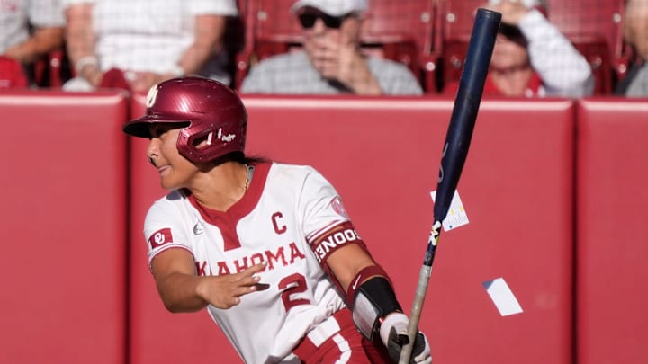 Oklahoma infielder Nelly McEnroe-Marinas (2) drives in two runs on a single in the second inning of a softball game in the Norman Regional of the NCAA Tournament between the University of Oklahoma Sooners (OU) and the Boston University Terriers at Love's Field in Norman, Okla., Friday, May 16, 2025.
