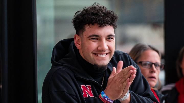 Nov 28, 2025; Lincoln, Nebraska, USA; Nebraska Cornhuskers quarterback Dylan Raiola (15) greets the team as the walk into the stadium before the game against the Iowa Hawkeyes at Memorial Stadium.