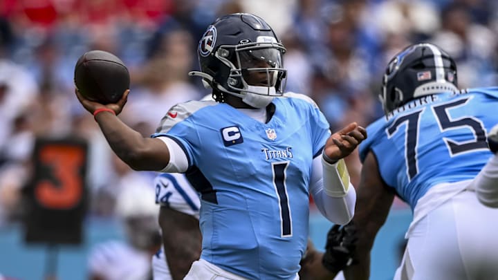 Sep 21, 2025; Nashville, Tennessee, USA; Tennessee Titans quarterback Cam Ward (1) throws a pass during the first quarter at Nissan Stadium. Mandatory Credit: Steve Roberts-Imagn Images