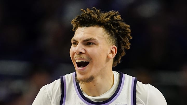 Dec 17, 2024; Kansas City, Missouri, USA; Kansas State Wildcats guard Coleman Hawkins (33) reacts after scoring during the second half against the Drake Bulldogs at T-Mobile Center. Mandatory Credit: Jay Biggerstaff-Imagn Images