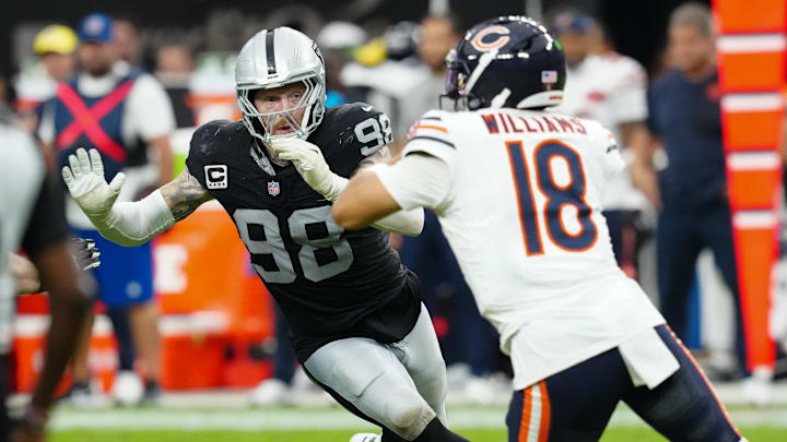 Maxx Crosby pressures Bears QB Caleb Williams during last year's 25-24 Bears win.