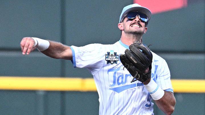 Jun 22, 2026; Omaha, NE, USA; North Carolina Tar Heels second baseman Gavin Gallaher (5) throws to first base against the North Carolina Tar Heels during the first inning at Charles Schwab Field. Mandatory Credit: Steven Branscombe-Imagn Images Jun 22, 2026; Omaha, NE, USA; North Carolina Tar Heels second baseman Gavin Gallaher (5) throws to first base against the North Carolina Tar Heels during the first inning at Charles Schwab Field. Mandatory Credit: Steven Branscombe-Imagn Images