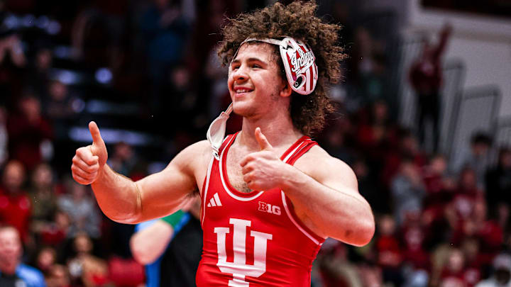 Indiana wrestler Joey Buttler celebrates during a meet against Purdue on Feb. 20, 2026.