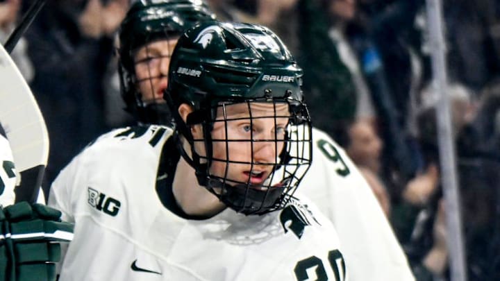 Michigan State's Daniel Russell, right, celebrates his goal against Ohio State in the second period of the Big Ten tournament game on Saturday, March 16, 2024, at Munn Arena in East Lansing.