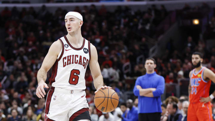 Jan 13, 2023; Chicago, Illinois, USA; Chicago Bulls guard Alex Caruso (6) brings the ball up court against the Oklahoma City Thunder during the first half at United Center. Mandatory Credit: Kamil Krzaczynski-USA TODAY Sports