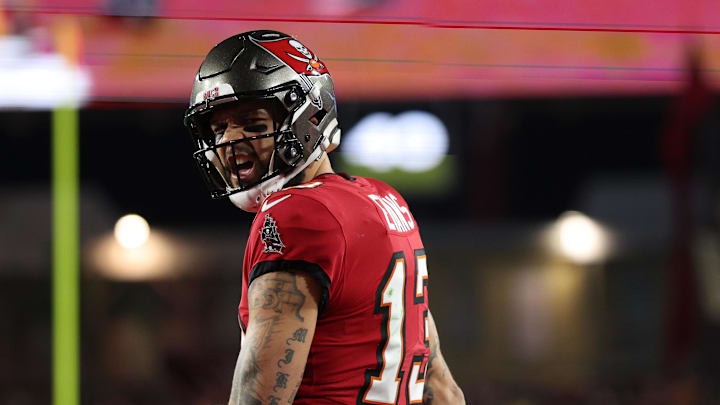 Tampa Bay Buccaneers wide receiver Mike Evans (13) reacts after a pass interference call during the second quarter of a NFC wild card playoff against the Washington Commanders.