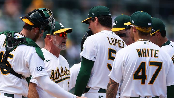 Jul 19, 2026; West Sacramento, California, USA; Athletics pitcher Jacob Lopez (57) talks with Athletics manager Mark Kotsay (7) before being pulled during the fifth inning against the Washington Nationals at Sutter Health Park. Mandatory Credit: Scott Marshall-Imagn Images Jul 19, 2026; West Sacramento, California, USA; Athletics pitcher Jacob Lopez (57) talks with Athletics manager Mark Kotsay (7) before being pulled during the fifth inning against the Washington Nationals at Sutter Health Park. Mandatory Credit: Scott Marshall-Imagn Images