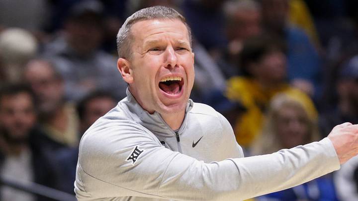 Jan 6, 2026; Morgantown, West Virginia, USA; West Virginia Mountaineers head coach Ross Hodge yells from the sideline during the second half against the Cincinnati Bearcats at Hope Coliseum. Mandatory Credit: Ben Queen-Imagn Images Jan 6, 2026; Morgantown, West Virginia, USA; West Virginia Mountaineers head coach Ross Hodge yells from the sideline during the second half against the Cincinnati Bearcats at Hope Coliseum. Mandatory Credit: Ben Queen-Imagn Images