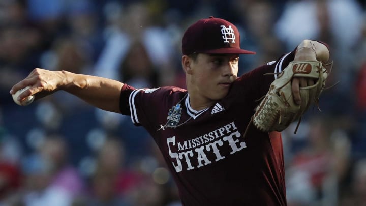 Mississippi State Bulldogs part itches JT Ginn throws in the first inning against the Louisville Cardinals in the 2019 College World Series at TD Ameritrade Park. Mississippi State Bulldogs part itches JT Ginn throws in the first inning against the Louisville Cardinals in the 2019 College World Series at TD Ameritrade Park.