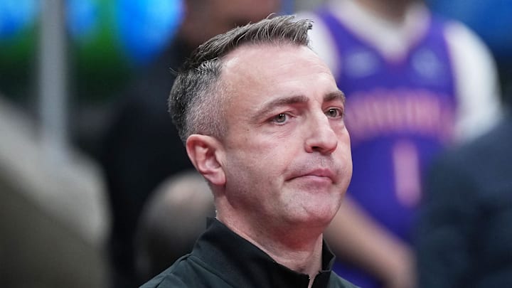 Toronto Raptors head coach Darko Rajakovic watches the pregame warmup before a game against the Indiana Pacers. Toronto Raptors head coach Darko Rajakovic watches the pregame warmup before a game against the Indiana Pacers.