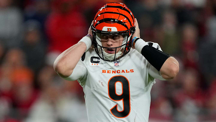 Cincinnati Bengals quarterback Joe Burrow (9) tries to block out crowd noise to hear a play call in the third quarter during a Week 15 NFL game against the Tampa Bay Buccaneers, Sunday, Dec. 18, 2022, at Raymond James Stadium in Tampa, Fla. The Cincinnati Bengals won, 34-23. The Cincinnati Bengals improved to 10-4 on the season.

Nfl Cincinnati Bengals At Tampa Bay Buccaneers Dec 18 0120
