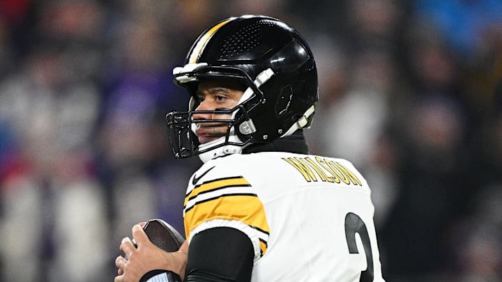Pittsburgh Steelers quarterback Russell Wilson looks to throw a pass.
